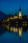 Slovenia, Lake Bled. Sunset lighting reflects in lake. Art Print